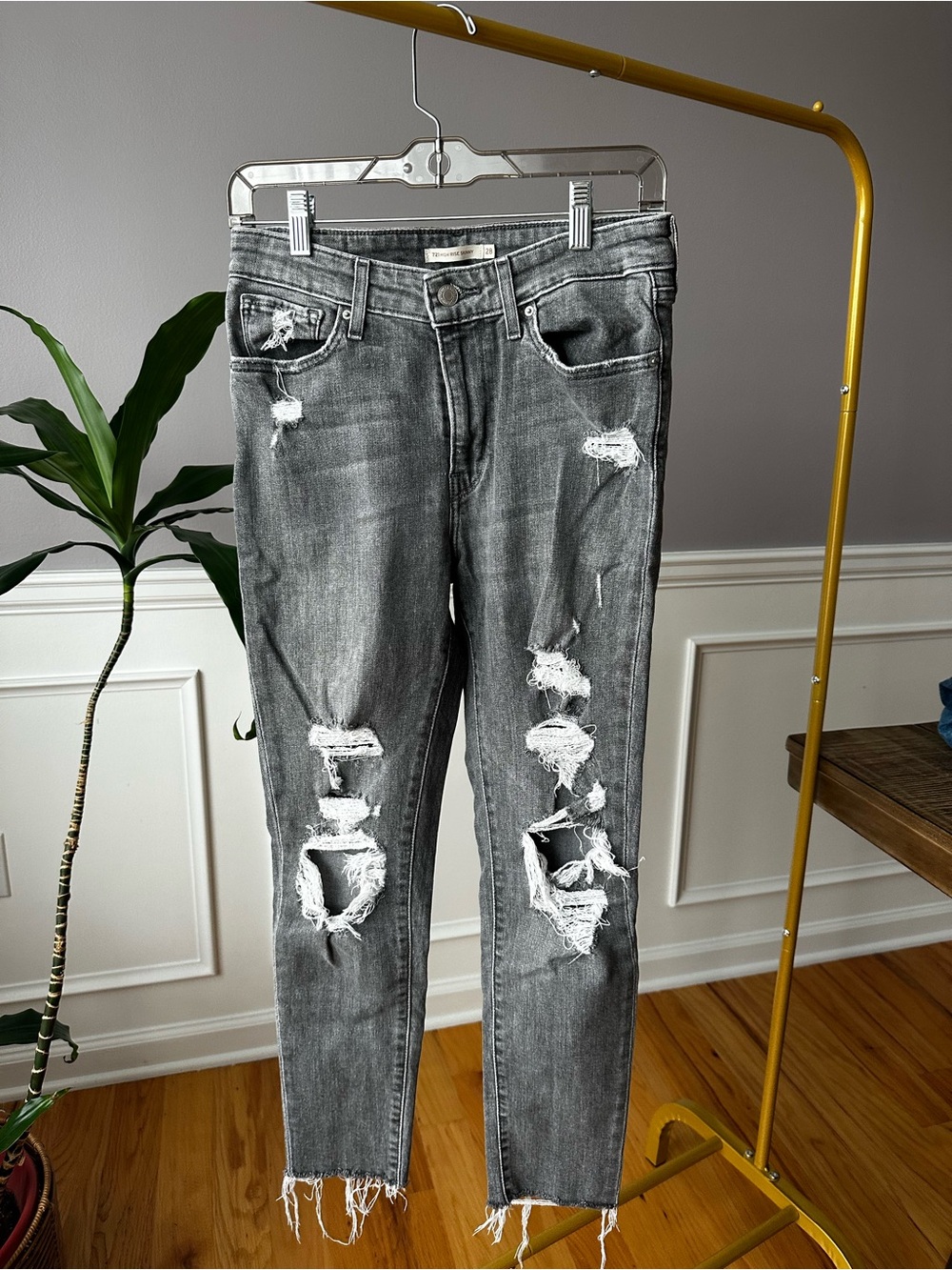 Distressed Black Women’s Levi’s Jeans
